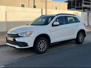 Mitsubishi  ASX  2018  Automatic  134,000 Km  4 Cylinder  Front Wheel Drive (FWD)  SUV  White