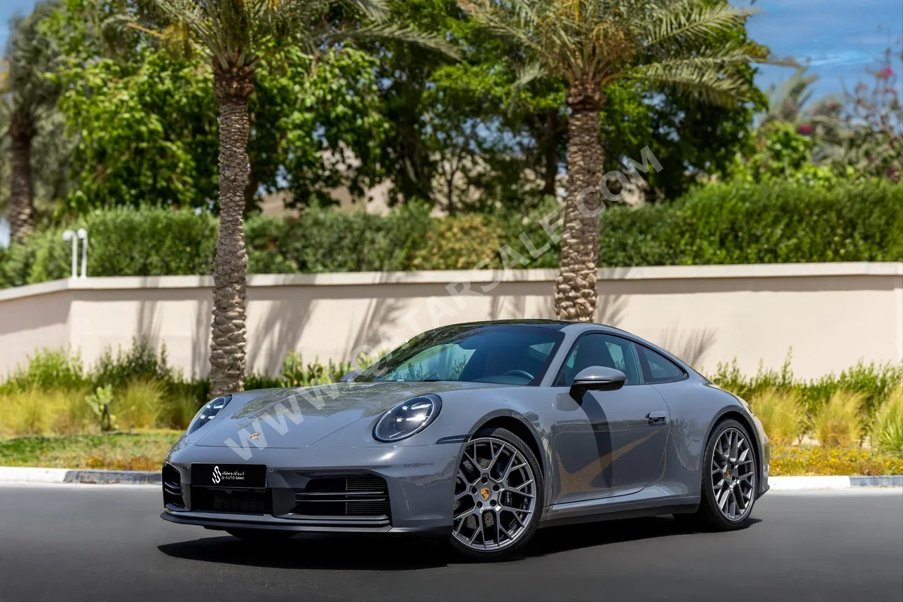 Porsche  911  Carrera  2025  Automatic  3,975 Km  6 Cylinder  Rear Wheel Drive (RWD)  Coupe / Sport  Silver  With Warranty