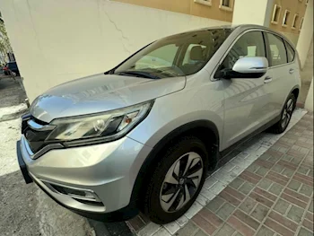 Honda  CRV  2015  Automatic  98,240 Km  4 Cylinder  All Wheel Drive (AWD)  SUV  Silver