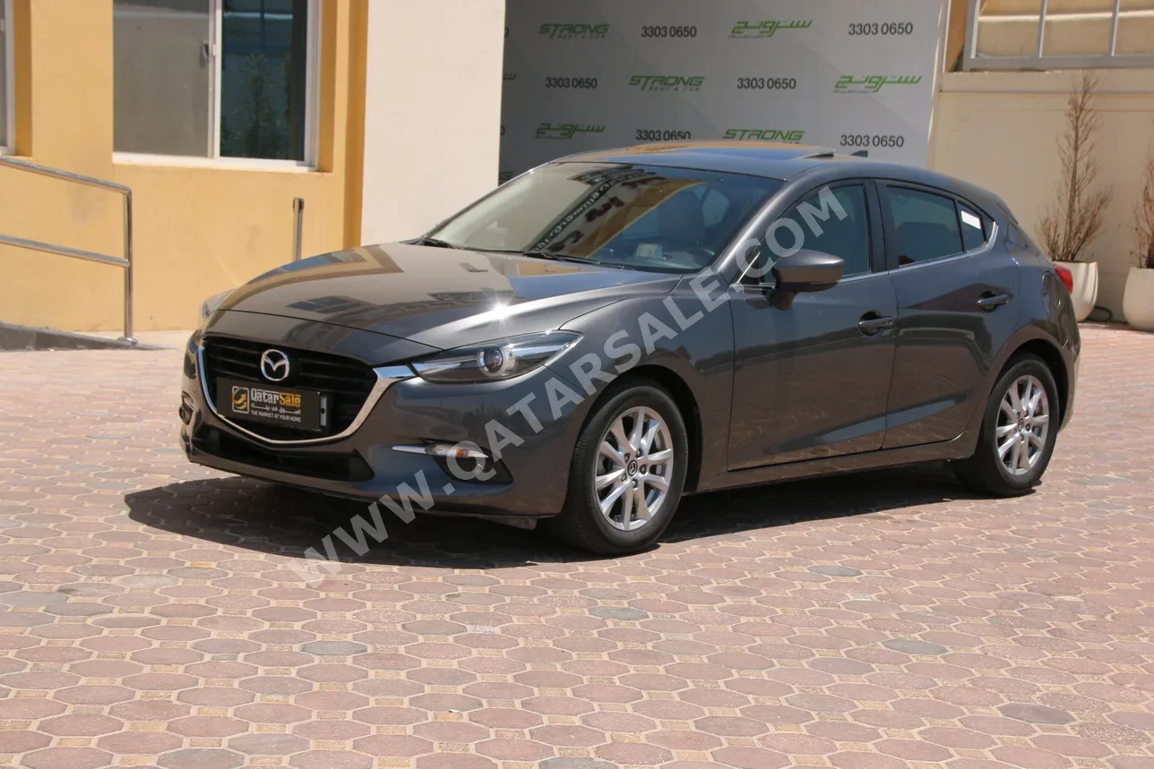 Mazda  Mazda 3  2019  Automatic  34,000 Km  4 Cylinder  Front Wheel Drive (FWD)  Hatchback  Gray