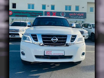 نيسان  باترول  بلاتنيوم  2014  اوتوماتيك  265,000 كم  8 سلندر  دفع رباعي  اس يو في  أبيض