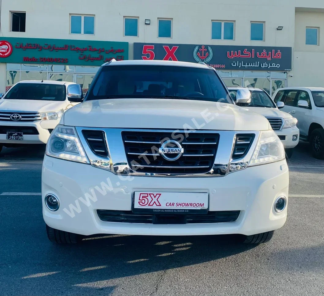 Nissan  Patrol  Platinum  2014  Automatic  265,000 Km  8 Cylinder  Four Wheel Drive (4WD)  SUV  White