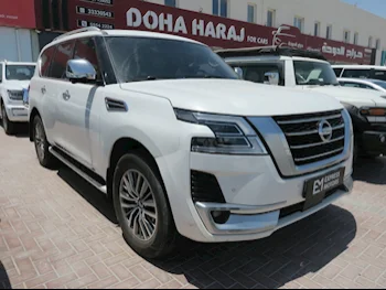 Nissan  Patrol  Platinum  2020  Automatic  116,000 Km  6 Cylinder  Four Wheel Drive (4WD)  SUV  White