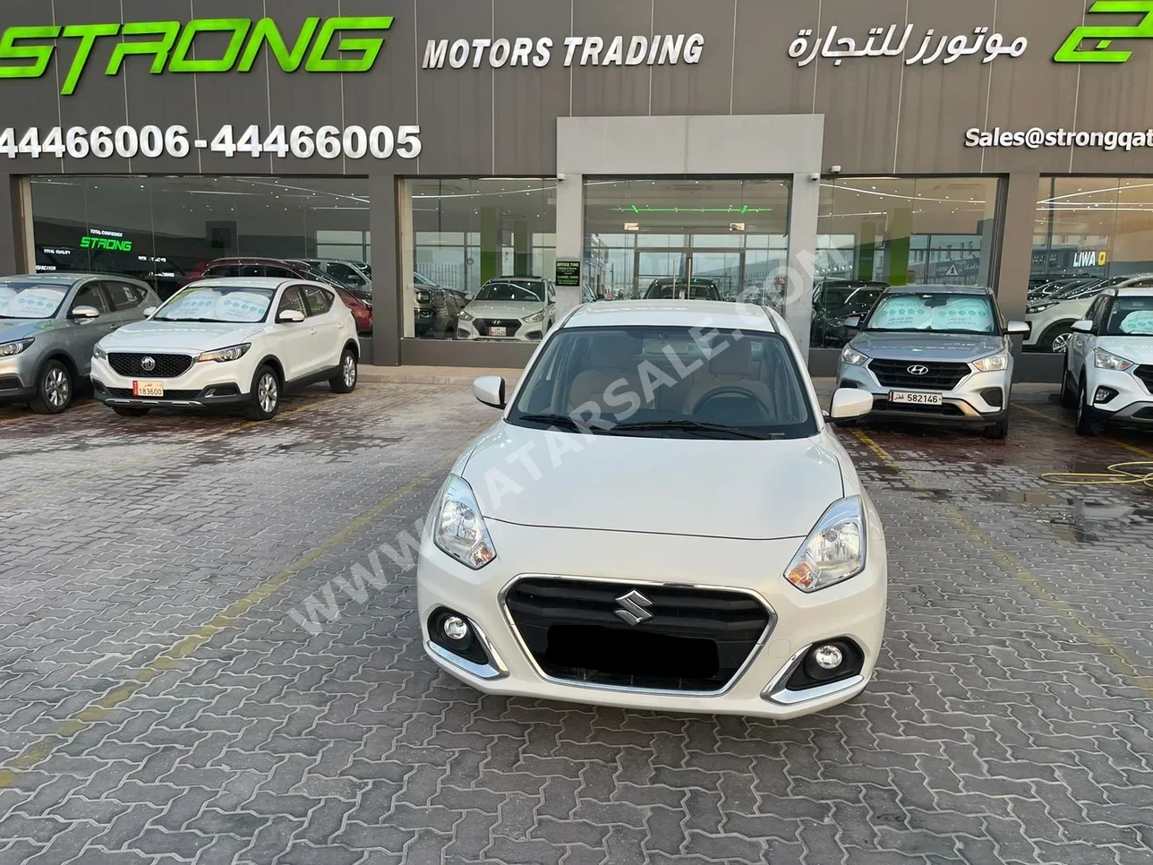 Suzuki  Dzire  2023  Automatic  95,000 Km  4 Cylinder  Front Wheel Drive (FWD)  Sedan  White