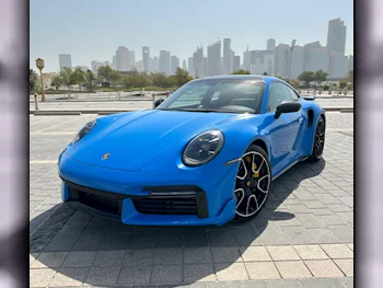 Porsche  911  Turbo S  2023  Automatic  11,000 Km  6 Cylinder  Rear Wheel Drive (RWD)  Coupe / Sport  Blue  With Warranty