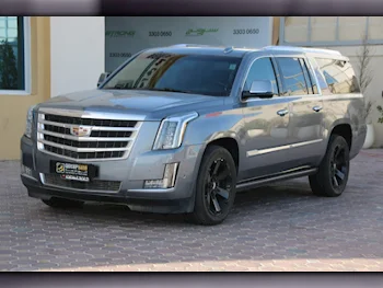 Cadillac  Escalade  Platinum  2018  Automatic  87,000 Km  8 Cylinder  Four Wheel Drive (4WD)  SUV  Light Sky Blue