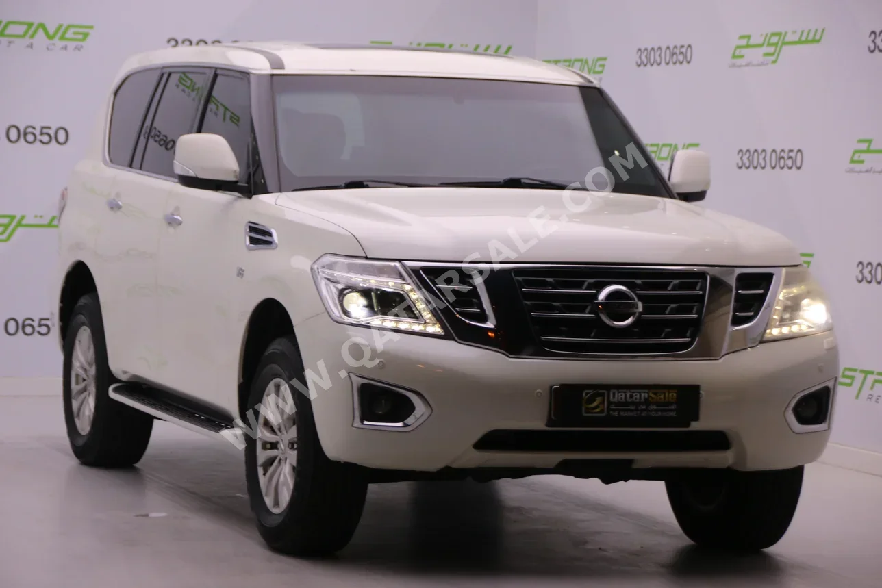 Nissan  Patrol  SE  2016  Automatic  232,000 Km  8 Cylinder  Four Wheel Drive (4WD)  SUV  White