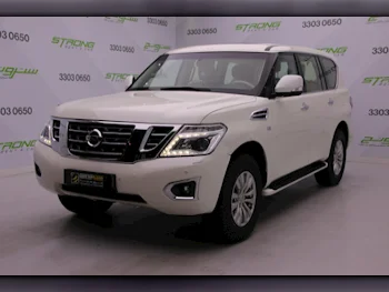 Nissan  Patrol  SE  2015  Automatic  138,000 Km  8 Cylinder  Four Wheel Drive (4WD)  SUV  White