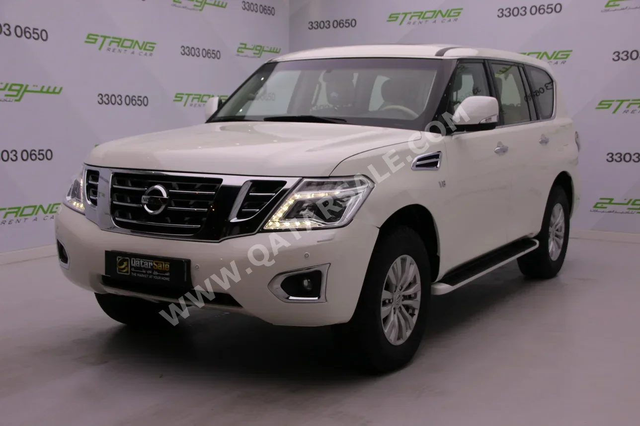 Nissan  Patrol  SE  2015  Automatic  138,000 Km  8 Cylinder  Four Wheel Drive (4WD)  SUV  White