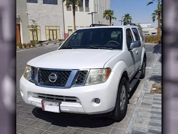 Nissan  Pathfinder  SE  2009  Automatic  310,000 Km  6 Cylinder  Four Wheel Drive (4WD)  SUV  White
