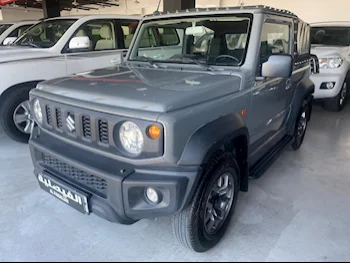 Suzuki  Jimny  2023  Automatic  5,000 Km  4 Cylinder  Four Wheel Drive (4WD)  SUV  Gray  With Warranty