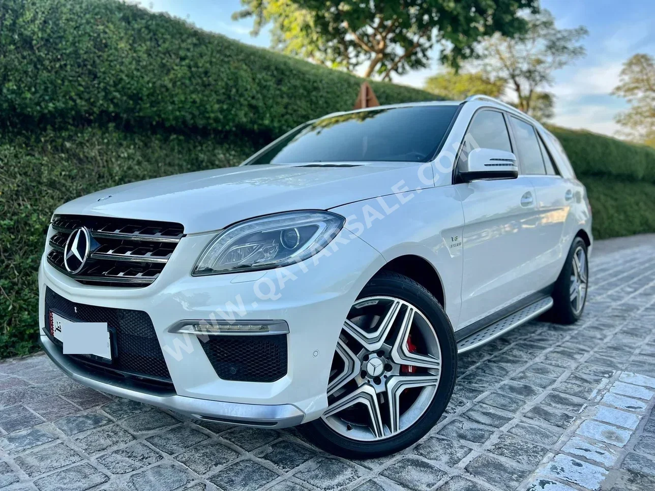 Mercedes-Benz  ML  63 AMG  2013  Automatic  89,000 Km  8 Cylinder  Four Wheel Drive (4WD)  SUV  White