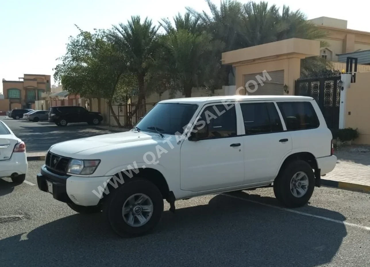Nissan  Patrol  2001  Manual  120,000 Km  6 Cylinder  Four Wheel Drive (4WD)  SUV  White