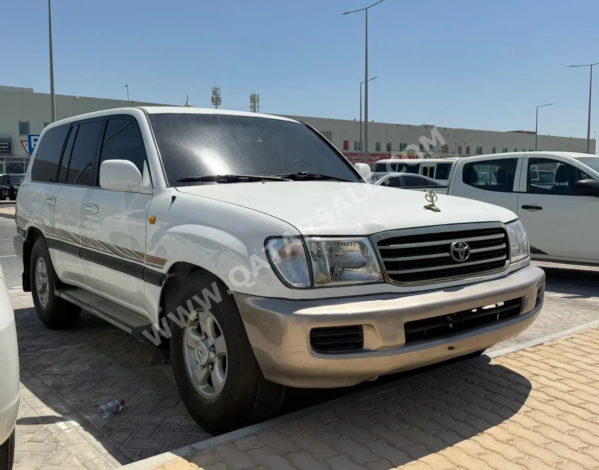 تويوتا  لاند كروزر  جي اكس ار  1999  اوتوماتيك  200,000 كم  6 سلندر  دفع رباعي  اس يو في  أبيض