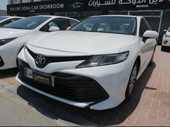 Toyota  Camry  LE  2019  Automatic  190,000 Km  4 Cylinder  Front Wheel Drive (FWD)  Sedan  White