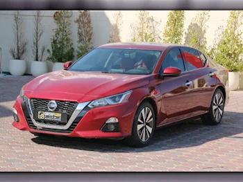 Nissan  Altima  2019  Automatic  63,000 Km  4 Cylinder  Front Wheel Drive (FWD)  Sedan  Red