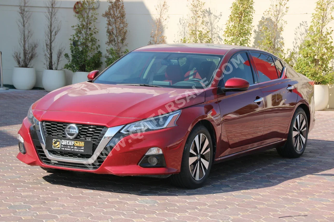 Nissan  Altima  2019  Automatic  63,000 Km  4 Cylinder  Front Wheel Drive (FWD)  Sedan  Red