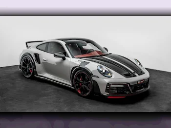 بورش  911  تك ارت جي تي سترييت ار اس  2024  اوتوماتيك  97 كم  6 سلندر  دفع خلفي  كوبيه \ سبورت  رمادي  تحت الضمان