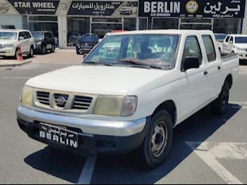 Nissan  Pickup  2001  Manual  999,999 Km  4 Cylinder  Rear Wheel Drive (RWD)  Pick Up  White