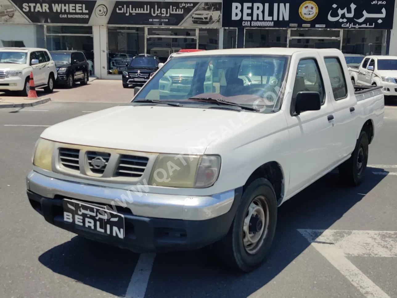 Nissan  Pickup  2001  Manual  999,999 Km  4 Cylinder  Rear Wheel Drive (RWD)  Pick Up  White