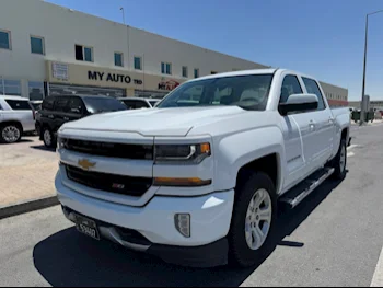Chevrolet  Silverado  LT  2017  Automatic  150,000 Km  8 Cylinder  Four Wheel Drive (4WD)  Pick Up  White