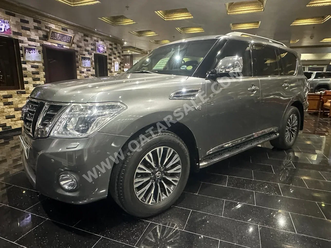 Nissan  Patrol  Platinum  2015  Automatic  208,000 Km  8 Cylinder  Four Wheel Drive (4WD)  SUV  Gray