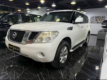 Nissan  Patrol  SE  2012  Automatic  211,000 Km  8 Cylinder  Four Wheel Drive (4WD)  SUV  White