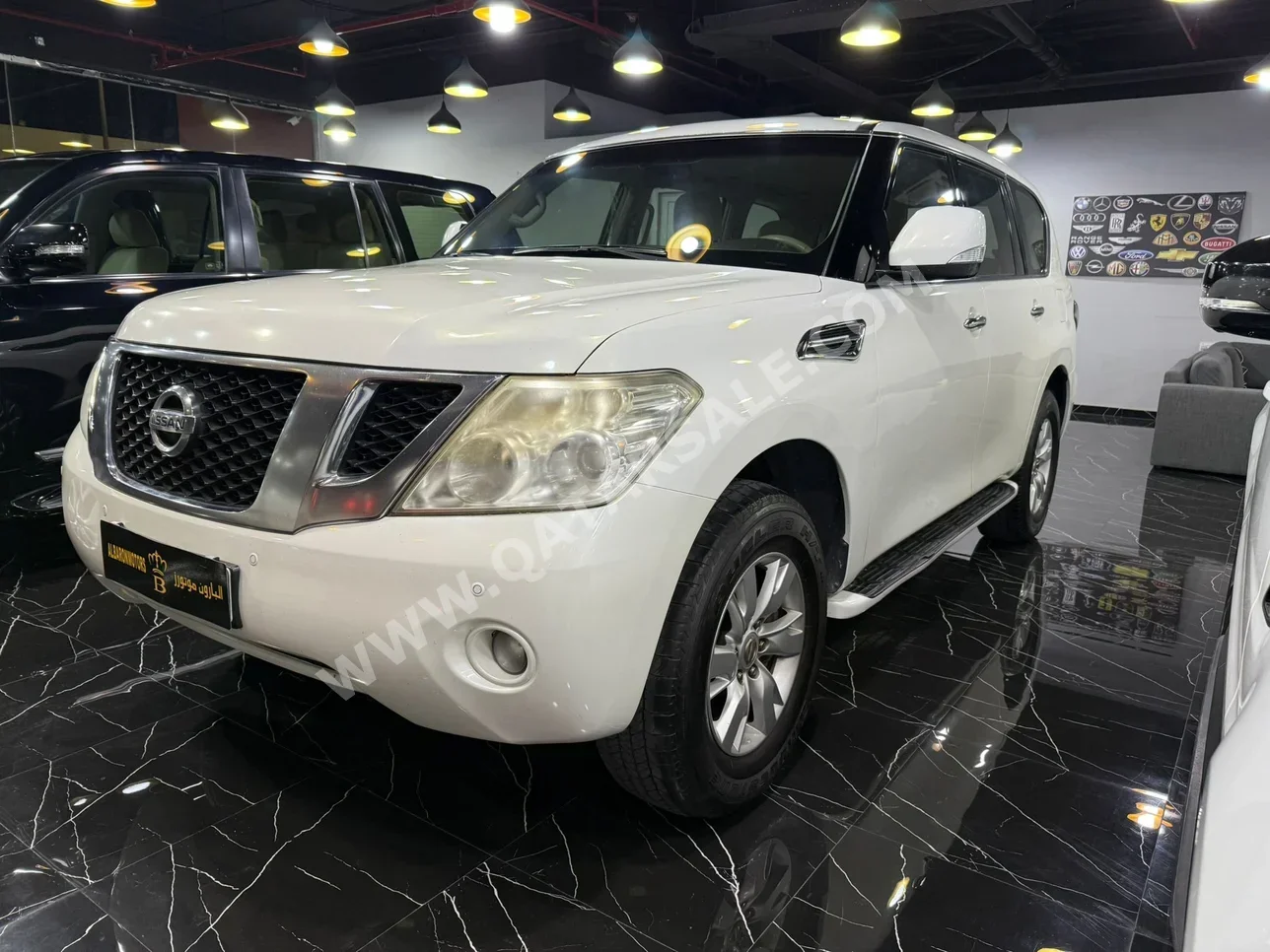 Nissan  Patrol  SE  2012  Automatic  211,000 Km  8 Cylinder  Four Wheel Drive (4WD)  SUV  White
