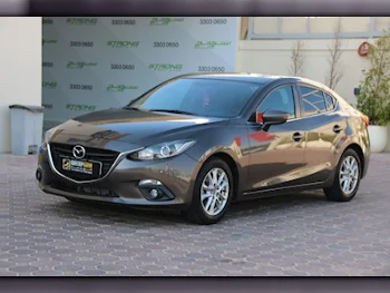 Mazda  Mazda 3  2015  Automatic  147,000 Km  4 Cylinder  Front Wheel Drive (FWD)  Sedan  Gray