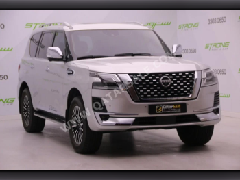Nissan  Patrol  Platinum  2023  Automatic  33,000 Km  6 Cylinder  Four Wheel Drive (4WD)  SUV  Silver  With Warranty