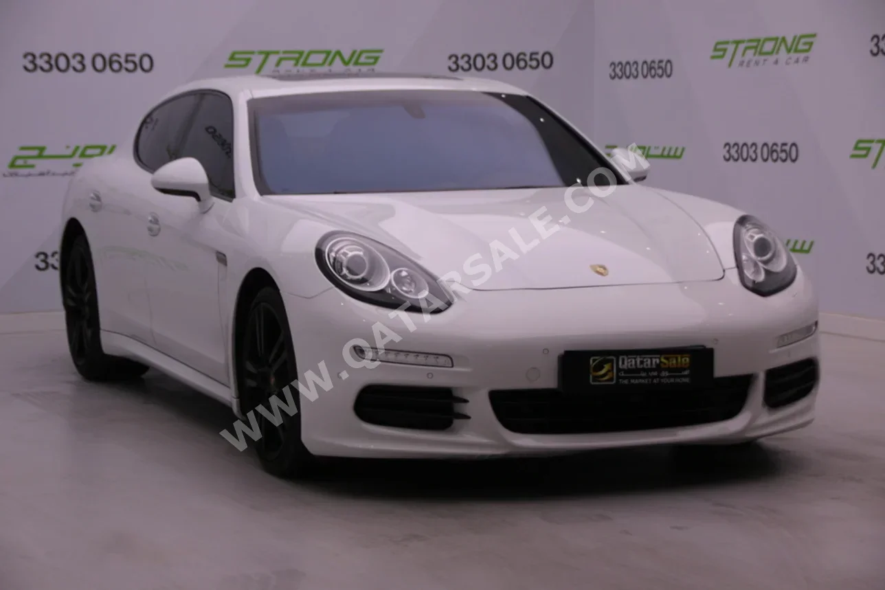 Porsche  Panamera  2014  Automatic  46,000 Km  6 Cylinder  Rear Wheel Drive (RWD)  Sedan  White