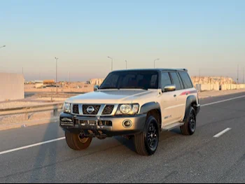 Nissan  Patrol  Super Safari  2018  Automatic  124,000 Km  6 Cylinder  Four Wheel Drive (4WD)  SUV  White