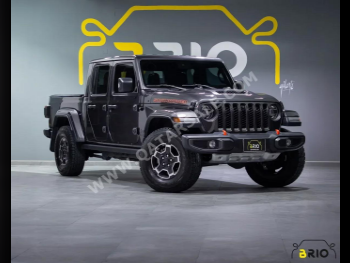 Jeep  Gladiator  Sand Runner  2021  Automatic  33,000 Km  6 Cylinder  Four Wheel Drive (4WD)  SUV  Dark Gray  With Warranty