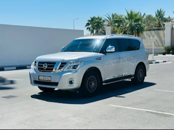 Nissan  Patrol  SE  2015  Automatic  234,000 Km  8 Cylinder  Four Wheel Drive (4WD)  SUV  Silver