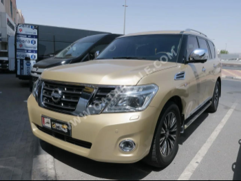 Nissan  Patrol  Platinum  2014  Automatic  261,000 Km  8 Cylinder  Four Wheel Drive (4WD)  SUV  Gold