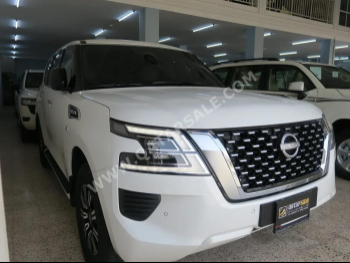Nissan  Patrol  XE  2024  Automatic  23,000 Km  8 Cylinder  Four Wheel Drive (4WD)  SUV  White  With Warranty