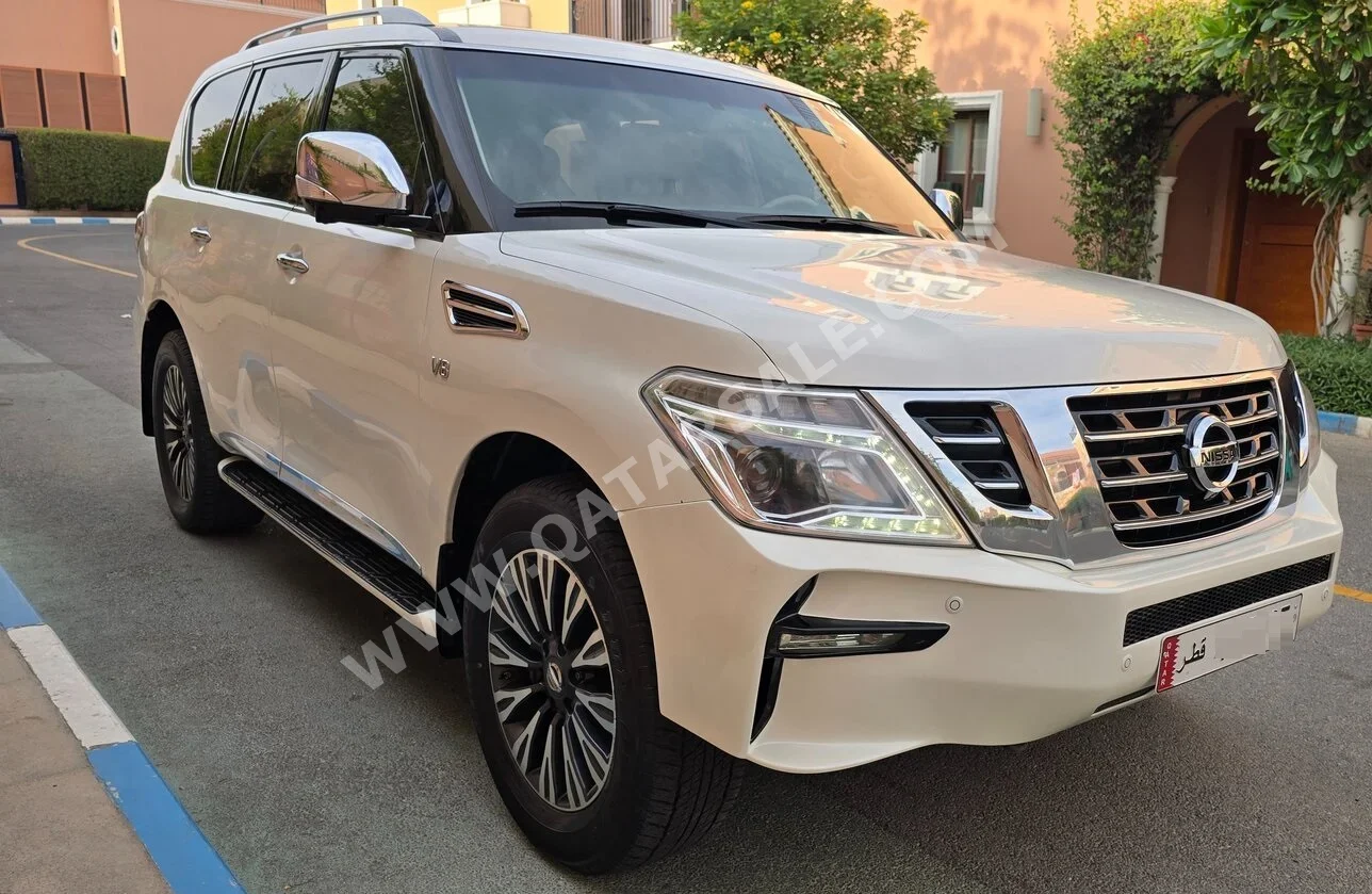 Nissan  Patrol  Platinum  2016  Automatic  145,000 Km  8 Cylinder  Four Wheel Drive (4WD)  SUV  White