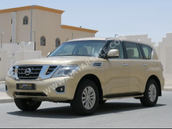 Nissan  Patrol  SE  2014  Automatic  278,000 Km  8 Cylinder  Four Wheel Drive (4WD)  SUV  Gold