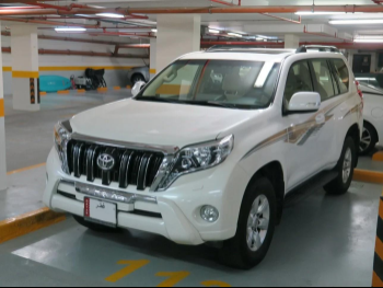 Toyota  Prado  TXL  2015  Automatic  130,000 Km  6 Cylinder  Four Wheel Drive (4WD)  SUV  White