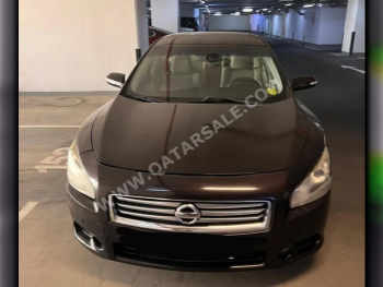 Nissan  Maxima  S  2012  Automatic  210,000 Km  6 Cylinder  Rear Wheel Drive (RWD)  Sedan  Maroon and Black