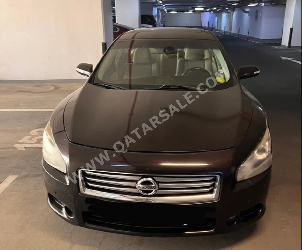 Nissan  Maxima  S  2012  Automatic  210,000 Km  6 Cylinder  Rear Wheel Drive (RWD)  Sedan  Maroon and Black