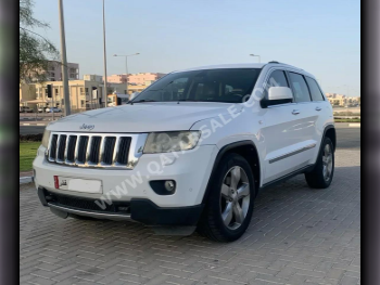 Jeep  Grand Cherokee  Limited  2013  Automatic  162,000 Km  6 Cylinder  Four Wheel Drive (4WD)  SUV  White