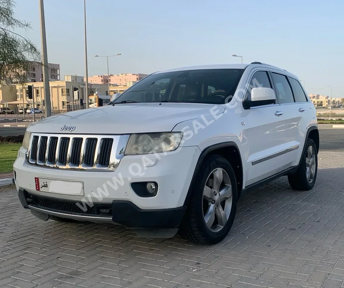 Jeep  Grand Cherokee  Limited  2013  Automatic  162,000 Km  6 Cylinder  Four Wheel Drive (4WD)  SUV  White