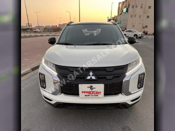 Mitsubishi  ASX  4 Cylinder  SUV ( AWD )  White  2025