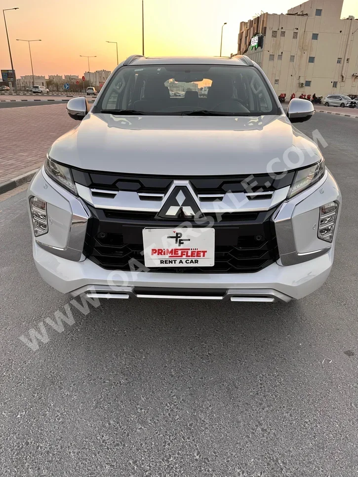متسوبيشي  مونترو سبورت  6 سلندر  إس يو في 4 في 4  أبيض  2025