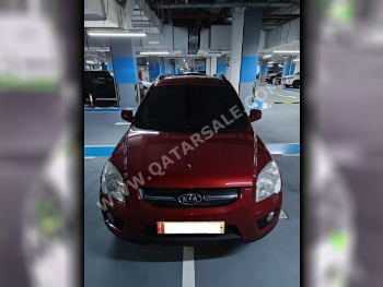 Kia  Sportage  2.0  2009  Automatic  179,000 Km  4 Cylinder  Four Wheel Drive (4WD)  SUV  Dark Red