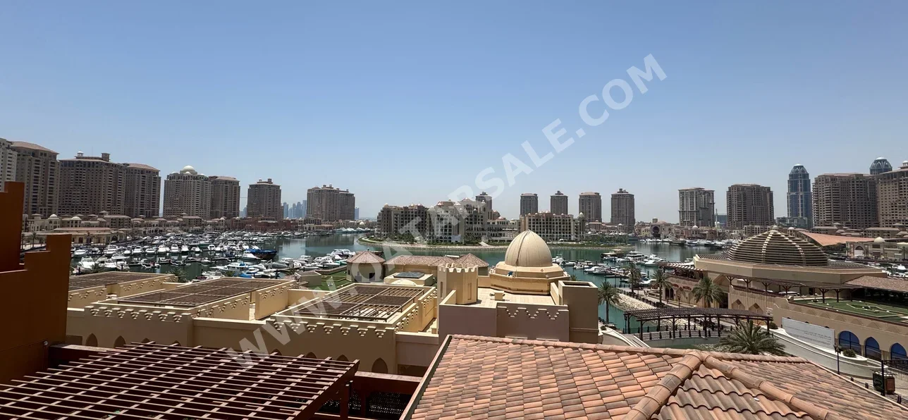 2 Bedrooms  Apartment  For Rent  in Doha -  The Pearl  Fully Furnished