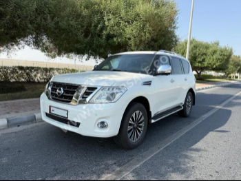 Nissan  Patrol  Platinum  2017  Automatic  137,000 Km  6 Cylinder  Four Wheel Drive (4WD)  SUV  White