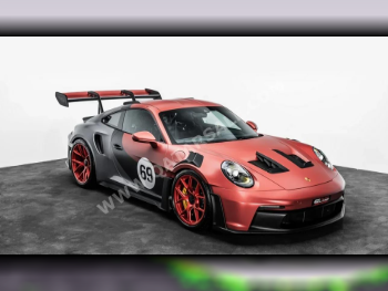 بورش  911  جي تي 3 ار اس  2025  اوتوماتيك  60 كم  6 سلندر  دفع خلفي  كوبيه \ سبورت  أحمر ورمادي