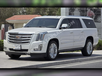Cadillac  Escalade  Platinum  2019  Automatic  50,000 Km  8 Cylinder  Four Wheel Drive (4WD)  SUV  White